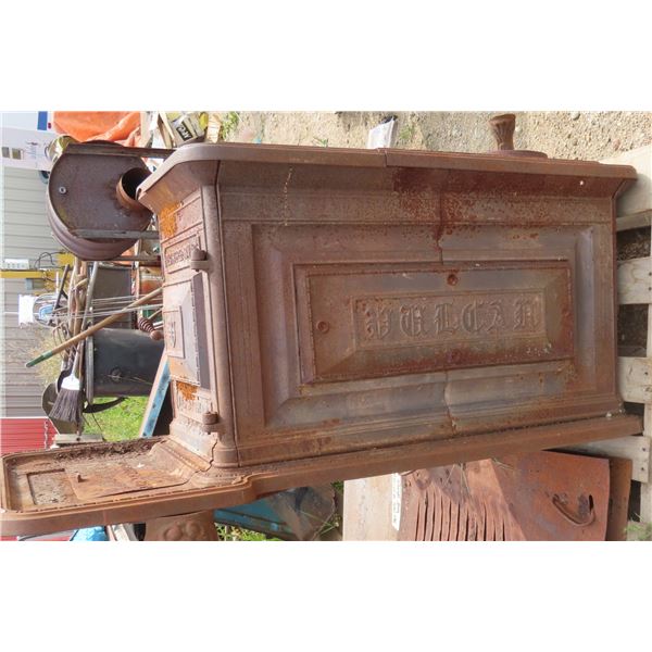 Antique stove/furnace (Legs are inside) - Jas Stewart - has several cracks