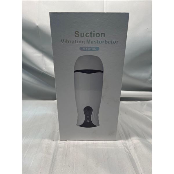 Suction vibrating masturbator