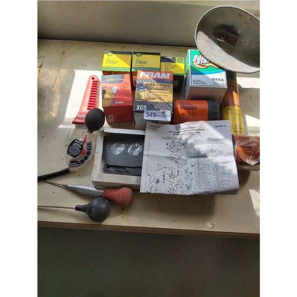 Assortment of Vehicle Oil Filters & Other Car Maintenance Items