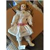 Image 1 : Porcelain Doll in a White Dress