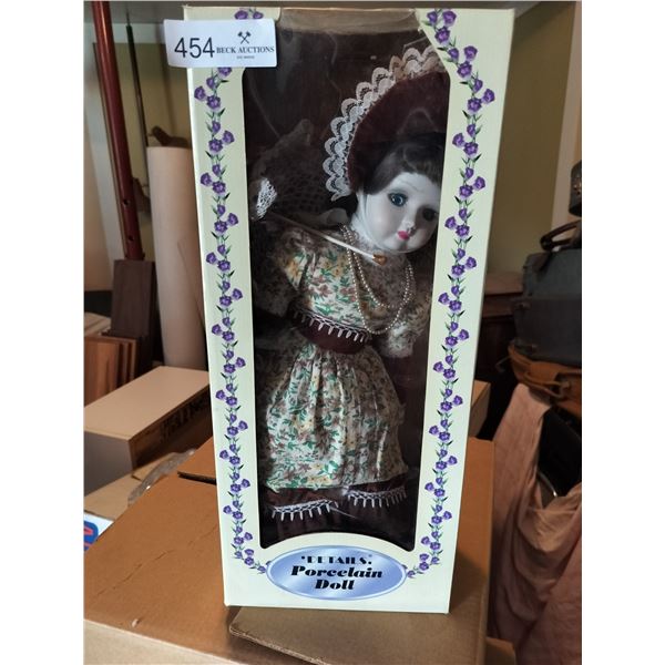 Details Porcelain Doll in Box