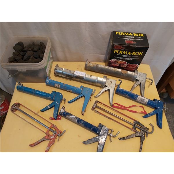 Assortment of Calking Guns & Perma Rock Ceramic Briquettes