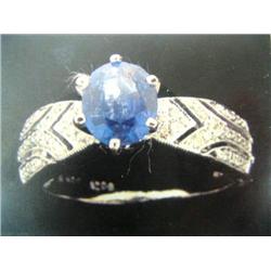 18 K white gold lady's ring, sapphire approx 1.24 cts, diamonds approx. .21cts replacement value $7,