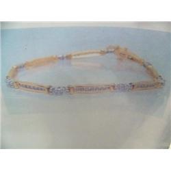 14 K yellow and white gold bracelet, round brilliant cut approx. 2 cts replacement cost $6120.00 Min