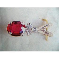 14 K white gold pendant and chain, Burmeses Ruby approx. .92 cts, diamonds approx. .09cts replacemen