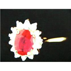 14 K yellow gold lady's ring, Burmese Ruby approx. .75cts, full cut diamonds approx .14 cts replacem