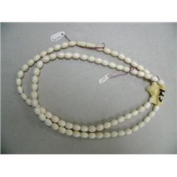Pair of Ivory Necklaces, 42" Valued at $110 each
