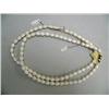 Image 1 : Pair of Ivory Necklaces, 42" Valued at $110 each