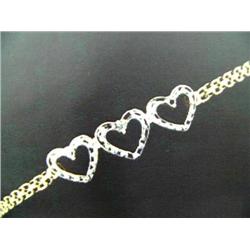 10 K yellow gold heart bracelet, single cut diamonds approx. .01 cts replacement cost $250.00