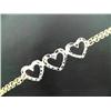 Image 1 : 10 K yellow gold heart bracelet, single cut diamonds approx. .01 cts replacement cost $250.00