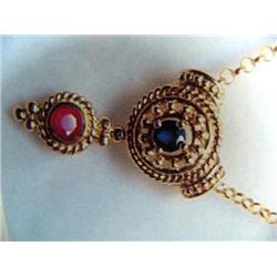 14 K yellow gold necklace, ruby approx. .15 cts, sapphire approx. .15 cts replacement cost $625.00