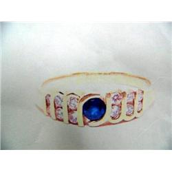 14 K yellow gold lady's ring, sapphire approx. .15 cts, diamonds approx. .20 cts replacement cost $9
