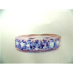 10 K white gold lady's ring, tanzanite approx. 1.00 cts replacement cost $595.00