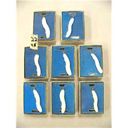 Lot of 8 Ivory Whale Fin Pendants