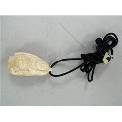 Ivory Walrus Tooth Carved w/ 4 Men's Faces, a Whale, and a Walrus Head