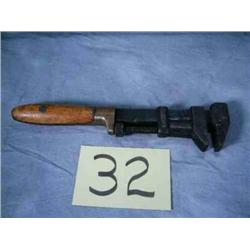 W. B. Co. Adjustable wrench w/wood handle