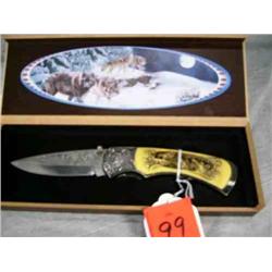 Folding knife - Wolf motif