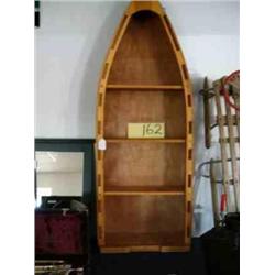 Row boat shaped bookcase