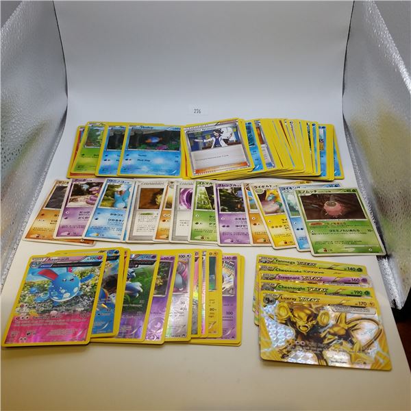 Assorted Lot of 65 Pokemon Cards