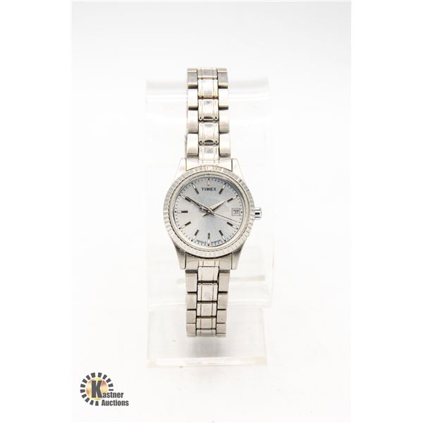 FLUTED BEZEL LADIES TIMEX WATCH WITH DATE