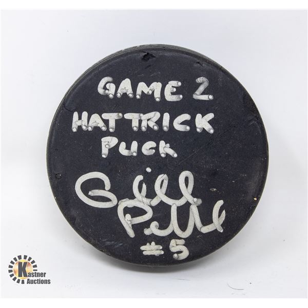 GAME USED AUTOGRAPHED HOCKEY PUCK