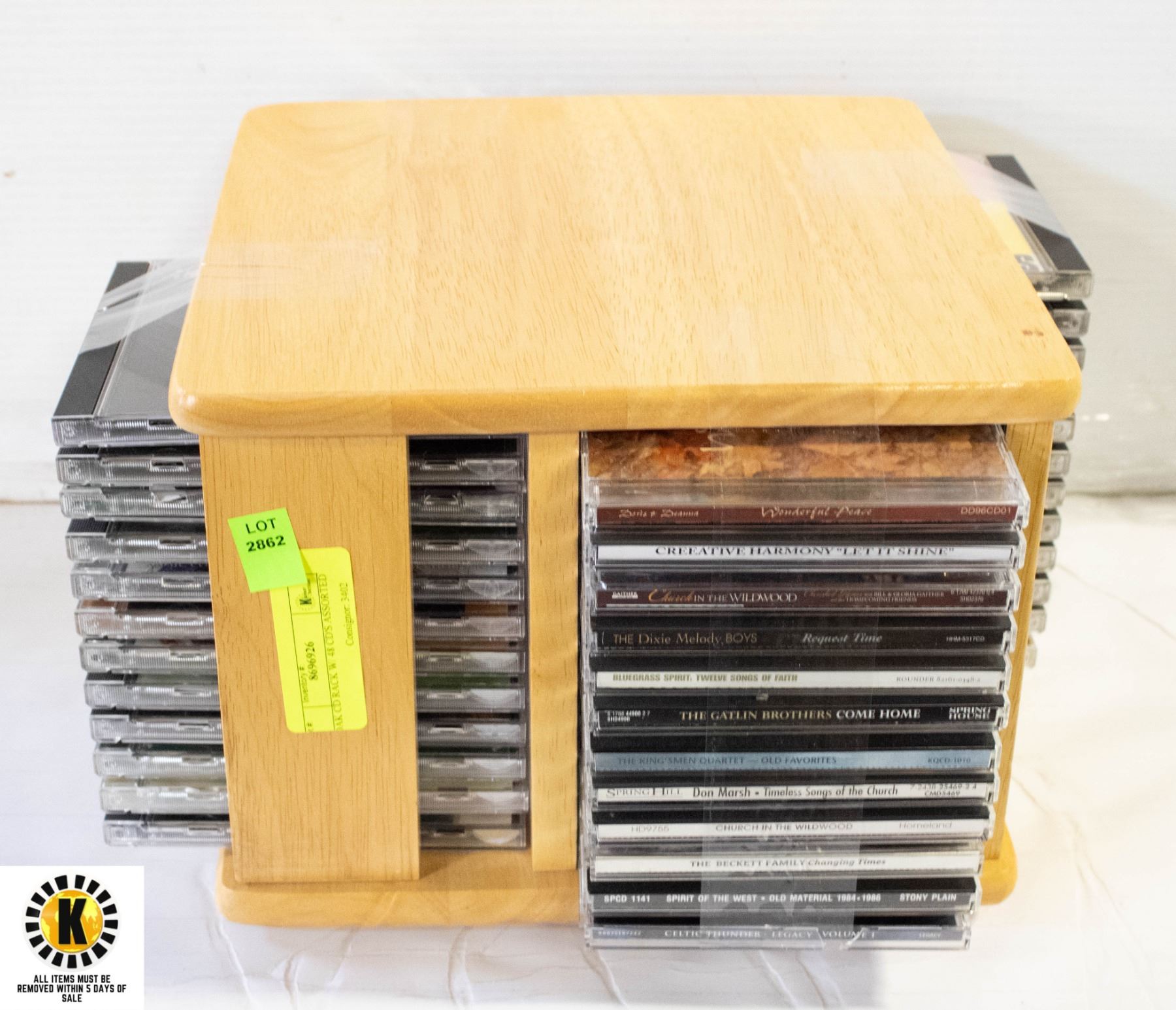 OAK CD RACK W/ 48 CD'S ASSORTED
