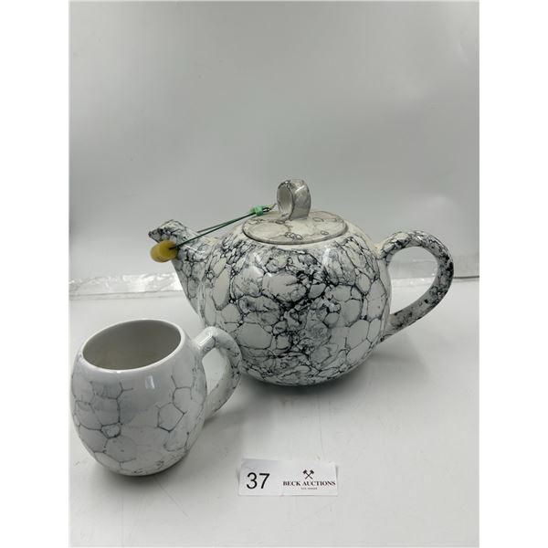 Marble Teapot Beck Auctions Inc.