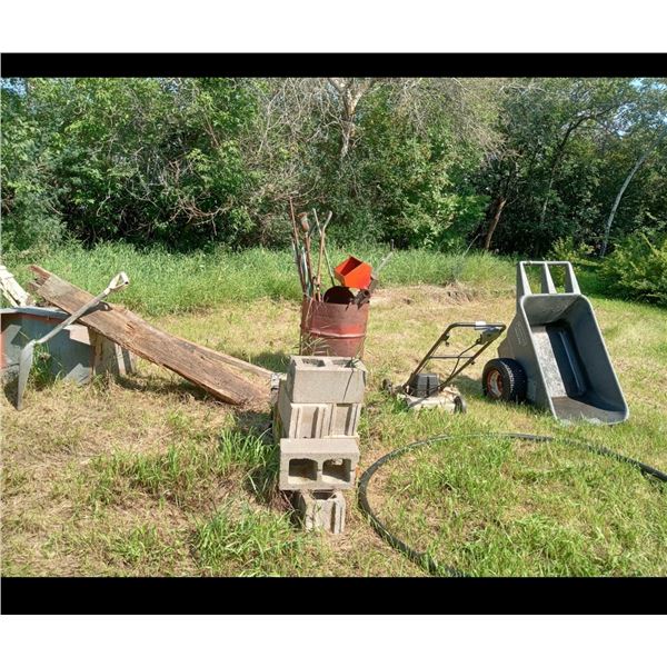 Assortment Of Yard Work Tools And Materials