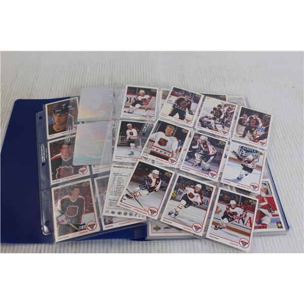 Assorted Sports Trading Cards in Folder