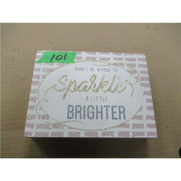 ESTATE:  SPARKLE SIGN