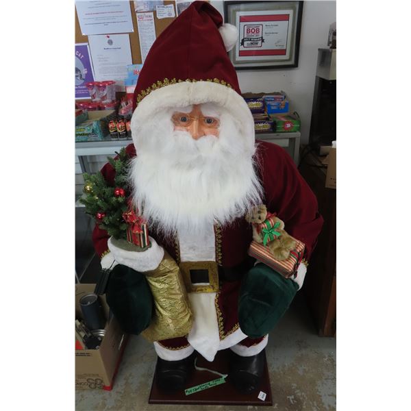 4.5ft Santa - Blow-up - comes with compressor & lights up - plays music - suite is cloth material