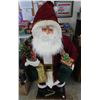 Image 1 : 4.5ft Santa - Blow-up - comes with compressor & lights up - plays music - suite is cloth material