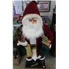 Image 1 : 4.5ft Santa - Blow-up - comes with compressor & lights up - plays music - suite is cloth material