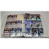 Image 3 : Binder of Tim Horton's 2022-23 Hockey cards - including DC cards, and Hockey Triumph - approx 22 sle