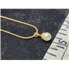 Image 4 : Gold colored necklace, with pearl pendant (can't say pearl is real or not)
