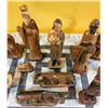 Image 3 : Old, hand-crafted and hand-painted, 14-piece nativity scene wood figurines.