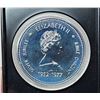 Image 2 : 1977 Queen Elizabeth Silver Jubilee Silver Dollar. Specimen. Bright White. Housed in its original RC