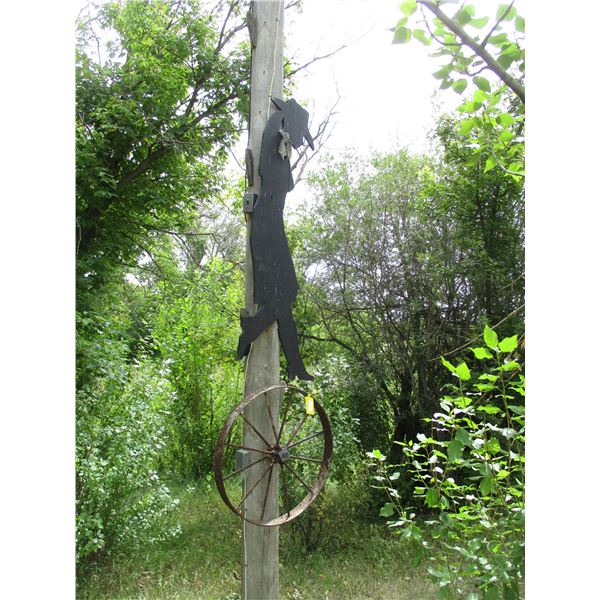 Steel Wheel and Cowgirl Silhouette