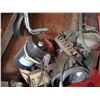Image 11 : Wall with Contents Alternators, Combine Motor, Rad ,Tires, Rope, Shelf, Belting,
