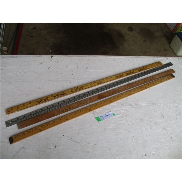 (4) Yard Sticks - 1 metal