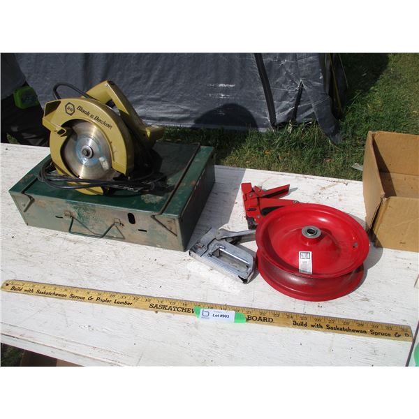 (2) Staplers, Coleman Stove, Tire Rim, Black & Decker Skill Saw