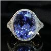 Image 1 : Modern Design Tanzanite and Diamond Halo Ring