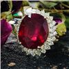 Image 1 : Grand Ruby and Tiered Diamond Halo Ring