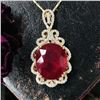 Image 1 : Ruby Pendant with Swirling Ribbon Diamond Halo