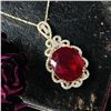 Image 2 : Ruby Pendant with Swirling Ribbon Diamond Halo