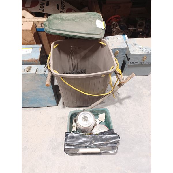 LARGE PLASTC TOTE THAT CAN BE USED AS A CAMP SHOWER AND HAS CAMPING ACCESSORIES