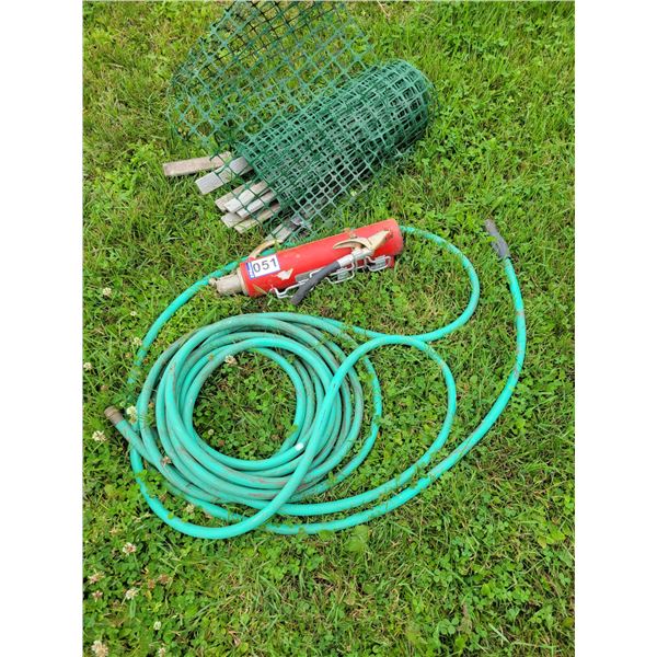 50 ft of Good garden hose, garden mesh, old fire ext.