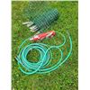 Image 1 : 50 ft of Good garden hose, garden mesh, old fire ext.