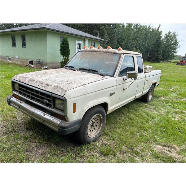 SELLING OFF SITE: Ford ranger, ext. cab, P/U truck, V6 engine, auto, toolbox, shows 159,219 km, alum