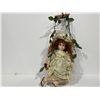 Image 1 : Porcelain Doll With Swing